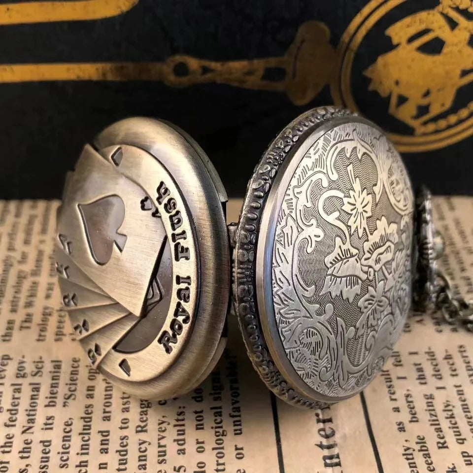 Bronze pocket watch poker design, close-up
